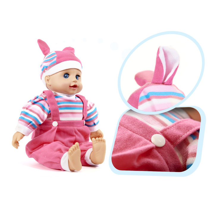 Maja játékbaba rózsaszín ruhában